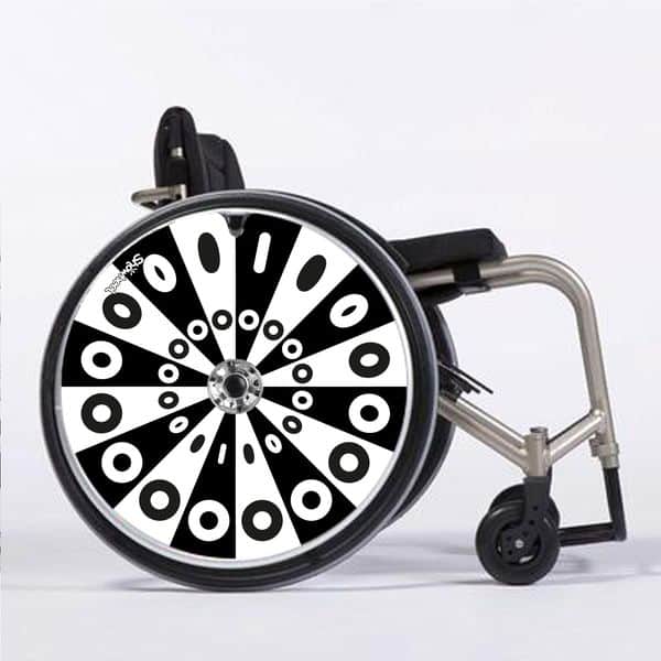 Fauteuil roulant avec une roue avec des motifs de donuts